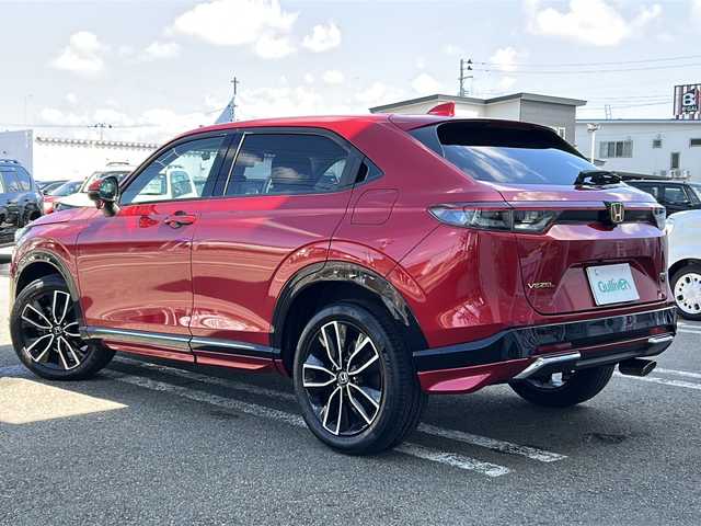 ホンダ ヴェゼル ハイブリッド e:HEV Z 秋田県 2021(令3)年 5.2万km プレミアムクリスタルレッドM ワンオーナー/４WD/純正9インチメモリナビ/フルセグTV/バックカメラ/ETC2.0/ドライブレコーダー/追従機能付クルーズコントロール/ホンダセンシング/ブラインドスポットインフォメーション/パドルシフト/ブラックハーフレザーシート/前席シートヒーター/純正フロアマット/OPグリル/純正エアロ（F/S/R）/純正18インチアルミ