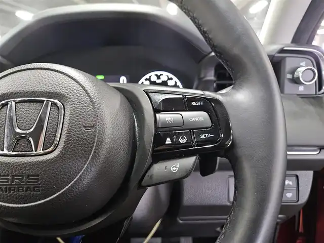 ホンダ ヴェゼル ハイブリッド e:HEV Z 秋田県 2021(令3)年 5.2万km プレミアムクリスタルレッドM 〇ワンオーナー/〇４WD/〇純正9インチナビ/〇フルセグTV/〇バックカメラ/〇純正ETC2.0/〇ドライブレコーダー/〇追従機能付クルーズコントロール/〇コーナーセンサー/〇ホンダセンシング/〇ブラインドスポットインフォメーション/〇LEDヘッドランプ/〇LEDフロントフォグランプ/〇ホンダコネクトディスプレイ/〇革巻きステアリングホイール/〇パドルシフト/〇左右独立温度調整オートエアコン/〇ブラックハーフレザーシート/〇前席シートヒーター/〇純正フロアマット/〇OPグリル/〇純正エアロ（F/S/R）/〇純正18インチアルミ/〇スマートキー/プッシュスタート/〇禁煙車