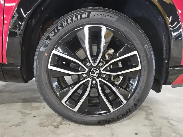 ホンダ ヴェゼル ハイブリッド e:HEV Z 秋田県 2021(令3)年 5.2万km プレミアムクリスタルレッドM 〇ワンオーナー/〇４WD/〇純正9インチナビ/〇フルセグTV/〇バックカメラ/〇純正ETC2.0/〇ドライブレコーダー/〇追従機能付クルーズコントロール/〇コーナーセンサー/〇ホンダセンシング/〇ブラインドスポットインフォメーション/〇LEDヘッドランプ/〇LEDフロントフォグランプ/〇ホンダコネクトディスプレイ/〇革巻きステアリングホイール/〇パドルシフト/〇左右独立温度調整オートエアコン/〇ブラックハーフレザーシート/〇前席シートヒーター/〇純正フロアマット/〇OPグリル/〇純正エアロ（F/S/R）/〇純正18インチアルミ/〇スマートキー/プッシュスタート/〇禁煙車