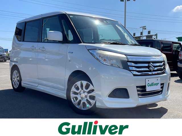 スズキ ソリオ HV MX 徳島県 2019(平31)年 8.2万km ピュアホワイトP 純正8型ナビ　CN-RZ843/（ラジオ/フルセグ/BT/USB/DISC）/バックカメラ/全方位カメラ/ビルトインETC/追従式クルーズコントロール/純正15インチアルミホイール/前方ドライブレコーダー/片側電動スライドドア/純正フロアマット/クリアランスソナー/D席シートヒーター/スマートキー/スペアキー/プッシュスタート