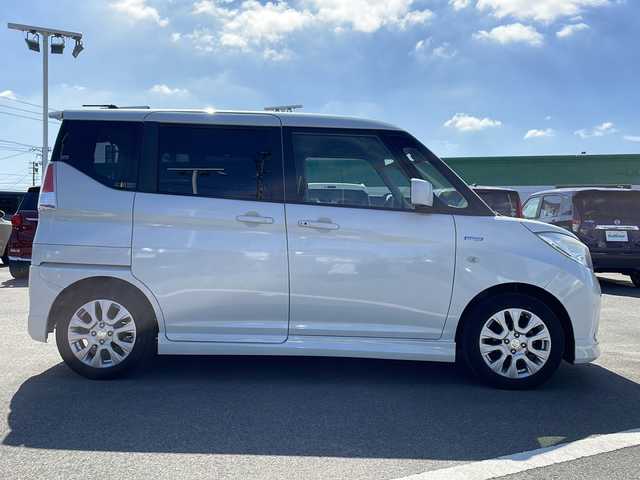 スズキ ソリオ HV MX 徳島県 2019(平31)年 8.2万km ピュアホワイトP 純正8型ナビ　CN-RZ843/（ラジオ/フルセグ/BT/USB/DISC）/バックカメラ/全方位カメラ/ビルトインETC/追従式クルーズコントロール/純正15インチアルミホイール/前方ドライブレコーダー/片側電動スライドドア/純正フロアマット/クリアランスソナー/D席シートヒーター/スマートキー/スペアキー/プッシュスタート