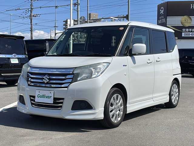 スズキ ソリオ HV MX 徳島県 2019(平31)年 8.2万km ピュアホワイトP 純正8型ナビ　CN-RZ843/（ラジオ/フルセグ/BT/USB/DISC）/バックカメラ/全方位カメラ/ビルトインETC/追従式クルーズコントロール/純正15インチアルミホイール/前方ドライブレコーダー/片側電動スライドドア/純正フロアマット/クリアランスソナー/D席シートヒーター/スマートキー/スペアキー/プッシュスタート