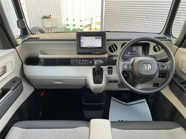 ホンダ Ｎ ＢＯＸ 石川県 2024(令6)年 0.6万km プラチナホワイトパール ホンダセンシング/社外メモリーナビ/CD/DVD/フルセグTV/バックカメラ/LEDヘッドライト/ETC/スマートキー/プッシュスタート/レーダークルーズ/ドライブレコーダー/シートヒーター/両側パワースライドドア/レーンキープ/オートライト/保証書