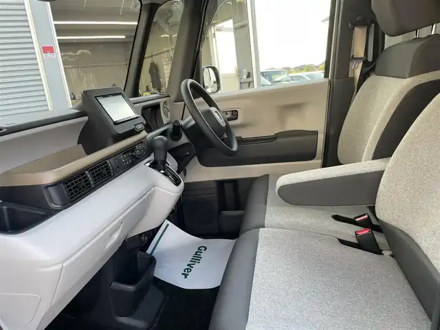 ホンダ Ｎ ＢＯＸ 石川県 2024(令6)年 0.6万km プラチナホワイトパール ホンダセンシング/社外メモリーナビ/CD/DVD/フルセグTV/バックカメラ/LEDヘッドライト/ETC/スマートキー/プッシュスタート/レーダークルーズ/ドライブレコーダー/シートヒーター/両側パワースライドドア/レーンキープ/オートライト/保証書