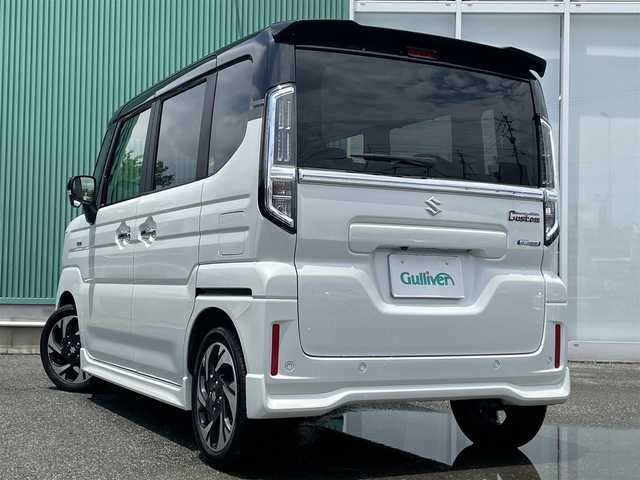 スズキ スペーシア カスタム HYBRID XS ターボ 福岡県 2024(令6)年 2.1万km ピュアホワイトパール/ブラック2トーン ワンオーナー/純正メモリナビゲーション/（フルセグTV/BT/Applecarplay）/全方位モニター/スリムサーキュレーター/ドライブレコーダー/デュアルセンサーブレーキサポートII/レーンキープアシスト/ブレーキホールド/LEDライト/フォグLEDライト/ビルトインETC/ハーフレザーシート/シートヒーター（D＋N）/本革ステアリング/ヒーター/2列目オットマン/両側パワースライドドア/エアバック（W＋サイド）/カーテンエアバック/純正15インチアルミホイール/アイドリングストップ/横滑り防止機能/フロアマット/荷室フロアマット/ドアバイザー/取扱説明書/新車保証書