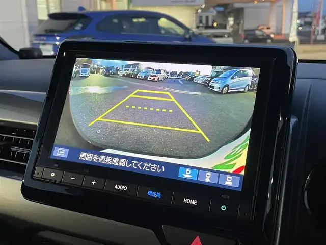 ホンダ Ｎ ＷＧＮ L スタイル+ビター 広島県 2025(令7)年 0.6万km ミッドナイトブルービームM ワンオーナー/メモリナビ/フルセグテレビ/バックカメラ/アイドリングストップ/クルーズコントロール（追従走行有り）/ドアバイザー/プッシュスタート/ETC/社外アルミホイール/社外サスペンション