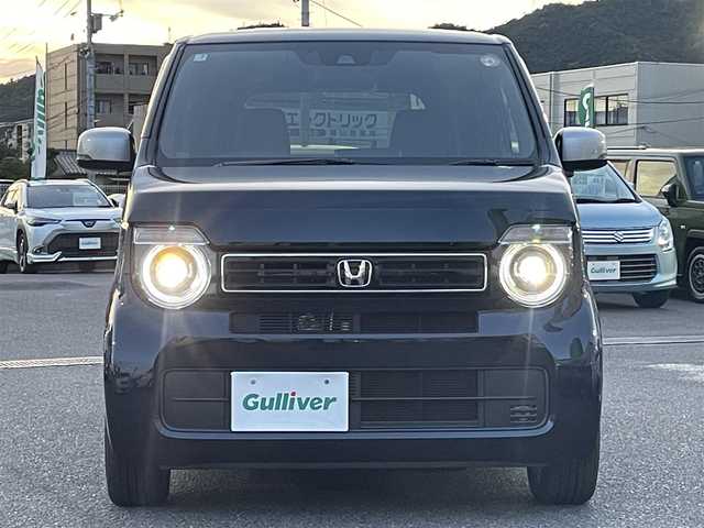ホンダ Ｎ ＷＧＮ L スタイル+ビター 広島県 2025(令7)年 0.6万km ミッドナイトブルービームM ワンオーナー/メモリナビ/フルセグテレビ/バックカメラ/アイドリングストップ/クルーズコントロール（追従走行有り）/ハーフレザーシート/プッシュスタート/ETC/社外15インチAW/社外サスペンション
