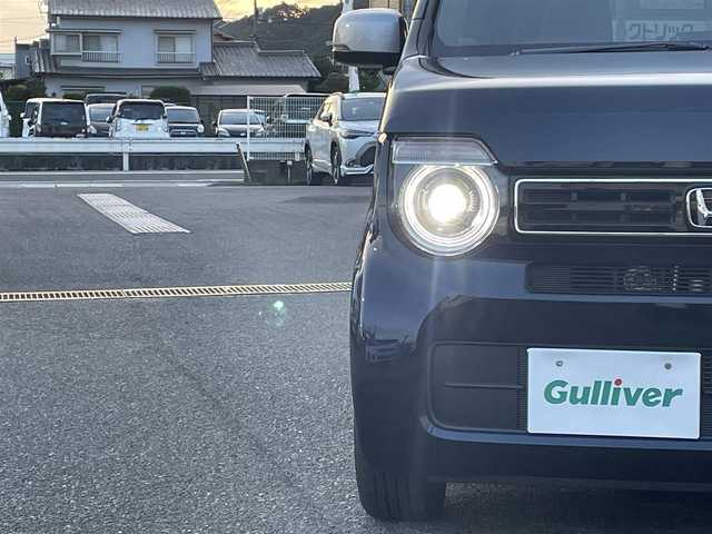 ホンダ Ｎ ＷＧＮ L スタイル+ビター 広島県 2025(令7)年 0.6万km ミッドナイトブルービームM ワンオーナー/メモリナビ/フルセグテレビ/バックカメラ/アイドリングストップ/クルーズコントロール（追従走行有り）/ハーフレザーシート/プッシュスタート/ETC/社外15インチAW/社外サスペンション
