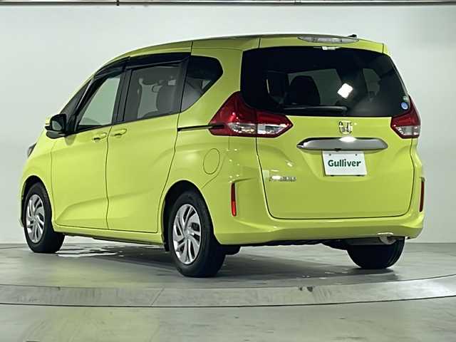 ホンダ フリード G ホンダセンシング 広島県 2017(平29)年 2.8万km シトロンドロップ 禁煙/ホンダセンシング/・衝突軽減ブレーキ〈CMBS〉/・誤発進抑制機能/・ACC〈アダプティブ・クルーズ・コントロール〉/・LKAS〈車線維持支援システム〉/・歩行者事故低減ステアリング/・路外逸脱抑制機能/・先行車発進お知らせ機能/・標識認識機能/社外ナビ（CN-RE03D）/・フルセグ/CD/DVD/Bluetooth/SD/REC/バックカメラ/両側パワースライドドア/ステアリングスイッチ/スマートキー/プッシュスタート/スペアキー/純正ドアバイザー/前後ドライブレコーダー（DRH-224SD）/ETC/純正15インチアルミホイール/Wエアバック