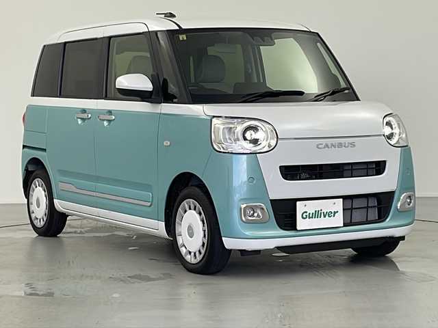ダイハツ ムーヴ キャンバス ストライプス G 岐阜県 2023(令5)年 0.1万km未満 シャイニングホワイトパール/ファインミントメタリック 純正ナビ　/フルセグＴＶ　/バックカメラ　/両側パワースライドドア　/スマートアシスト　/エンジンスタートボタン　/スマートキー　/ホッとドリンクホルダー　/コーナーセンサー　/シートヒーター　/Ｂｌｕｅｔｏｏｔｈ/LEDヘッドライト/電子パーキング/USB入力端子