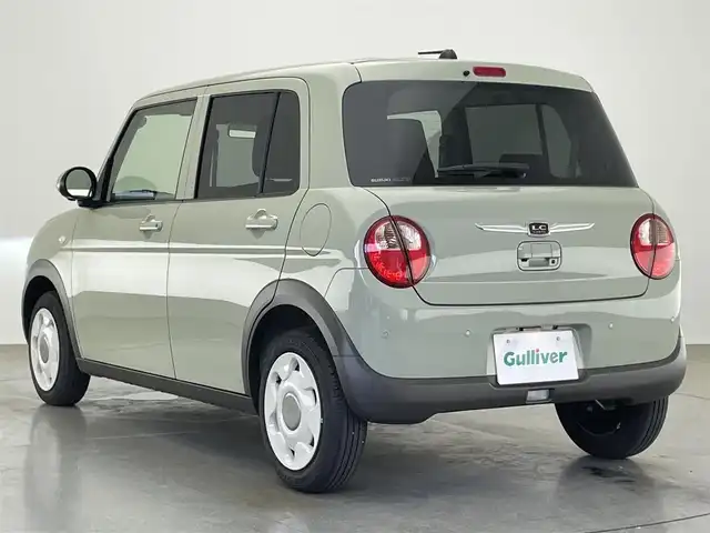 スズキ ラパン ＬＣ L 愛知県 2024(令6)年 0.3万km トラッドカーキメタリック 全方位モニター用カメラＰＫＧ装着車　デュアルカメラブレーキ　衝突軽減装置　車線逸脱　リヤパーキングセンサー　ＬＥＤオートライト　プッシュスタート　ハーフレザー　シートヒーター　純正フロアマット　禁煙車