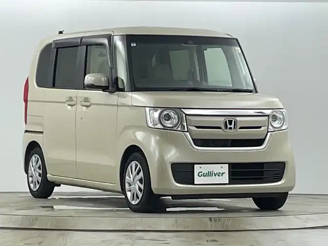 ホンダ Ｎ ＢＯＸ G L ホンダセンシング 愛知県 2019(平31)年 1.5万km プレミアムアイボリーパールⅡ 純正８インチナビ（AM/FM/ワンセグ/BT/CD/DVD）/片側パワースライドドア/レーダークルーズコントロール/リアドア側サンシェード/充電専用USBジャック×２/ホンダセンシング/・衝突軽減ブレーキ/・レーンキープアシスト/・横滑り防止機能/・クリアランスソナー/・先行車発進通知/・標識認識機能/LEDヘッドライト/バックカメラ/スマートキー/プッシュスタート/純正前後ドライブレコーダー/ビルトインETC/純正フロアマット/純正ホイールキャップ/LEDヘッドライト/ドアバイザー/アイドリングストップ/ステアリングスイッチ/ドアバイザー/前後コーナーセンサー