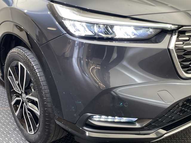 ホンダ ヴェゼル ハイブリッド e:HEV Z 愛媛県 2023(令5)年 5.1万km メテオロイドグレーメタリック ９型ナビ/フルセグ／Ｂｌｕｅｔｏｏｔｈ／ＵＳＢ／ａｐｐｌｅｃａｒｐｌａｙ／ａｎｄｒｏｉｄａｕｔｏ/バックカメラ/衝突軽減ブレーキ/レーダークルーズコントロール/ＥＴＣ２．０/前方ドライブレコーダー/レーンキープアシスト/前後コーナーセンサー/パワーバックドア/DN席シートヒーター/LEDヘッドライト