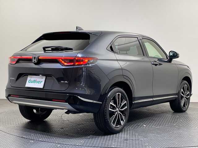 ホンダ ヴェゼル ハイブリッド e:HEV Z 愛媛県 2023(令5)年 5.1万km メテオロイドグレーメタリック ９型ナビ/フルセグ／Ｂｌｕｅｔｏｏｔｈ／ＵＳＢ／ａｐｐｌｅｃａｒｐｌａｙ／ａｎｄｒｏｉｄａｕｔｏ/バックカメラ/衝突軽減ブレーキ/レーダークルーズコントロール/ＥＴＣ２．０/前方ドライブレコーダー/レーンキープアシスト/前後コーナーセンサー/パワーバックドア/DN席シートヒーター/LEDヘッドライト