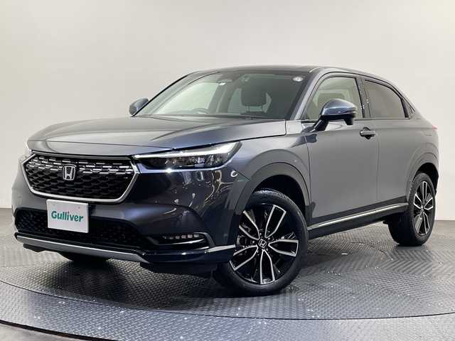 ホンダ ヴェゼル ハイブリッド e:HEV Z 愛媛県 2023(令5)年 5.1万km メテオロイドグレーメタリック ９型ナビ/フルセグ／Ｂｌｕｅｔｏｏｔｈ／ＵＳＢ／ａｐｐｌｅｃａｒｐｌａｙ／ａｎｄｒｏｉｄａｕｔｏ/バックカメラ/衝突軽減ブレーキ/レーダークルーズコントロール/ＥＴＣ２．０/前方ドライブレコーダー/レーンキープアシスト/前後コーナーセンサー/パワーバックドア/DN席シートヒーター/LEDヘッドライト