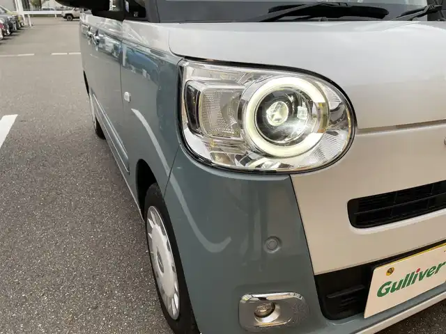 ダイハツ ムーヴ キャンバス ストライプス G 石川県 2024(令6)年 0.2万km シャイニングホワイトパール/レイクブルーメタリック 純正ディスプレイオーディオ/全方位カメラ/LEDヘッドライト/スマートアシスト/オートライト/両側パワースライドドア/レーンキープアシスト/クリアランスソナー/プッシュスタート/電動ミラー/ベンチシート/保証書