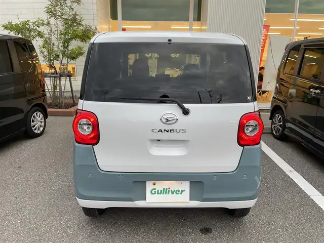 ダイハツ ムーヴ キャンバス ストライプス G 石川県 2024(令6)年 0.2万km シャイニングホワイトパール/レイクブルーメタリック 純正ディスプレイオーディオ/全方位カメラ/LEDヘッドライト/スマートアシスト/オートライト/両側パワースライドドア/レーンキープアシスト/クリアランスソナー/プッシュスタート/電動ミラー/ベンチシート/保証書