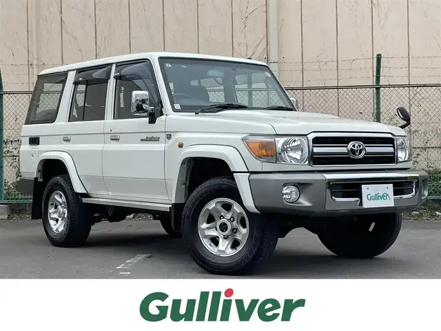 トヨタ ランドクルーザー 東京都 2015(平27)年 2.6万km ホワイト ５ＭＴ　/４ＷＤ　/アルパインナビ/前後ドラレコ　/ＥＴＣ　/バックカメラ　/キーレス　/Ｂｌｕｅｔｏｏｔｈ　/純正１６インチＡＷ　/背面タイヤ　/メッキドアミラー　/フォグランプ　/純正ドアバイザー　/純正フロアマット