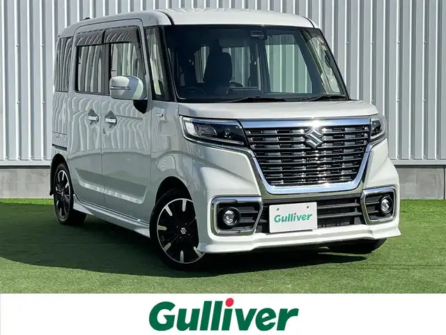 スズキ スペーシア カスタム HYBRID XS 香川県 2020(令2)年 3.8万km ピュアホワイトP 登録時走行距離：37393km/ディーラーオプション純正7インチディスプレイオーディオ/CD/DVD/Bluetooth/バックカメラ/衝突被害軽減システム/横滑り防止装置/レーンキープアシスト/後方コーナーセンサー/アイドリングストップ/LEDヘッドライト/フォグランプ/オートライト/ハーフレザーシート/運転席シートヒーター/両側パワースライドドア/エンジンスタートボタン/スマートキー/純正フロアマット/純正15インチアルミホイール