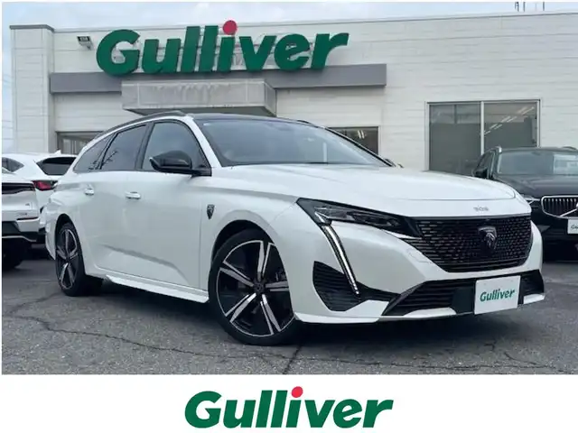 プジョー ３０８ SW GTハイブリッド 三重県 2022(令4)年 0.7万km パール レーンキープアシスト/ドライバーアテンションアラート/アクティブセーフティブレーキ/アクティブクルーズコントロール/レーンポジショニングアシスト/ブラインドスポットモニターロングレンジ/フロント/バックソナー/リアトラフィックアラート/パノラミックサンルーフ/360°ビジョン/純正メモリーナビゲーション/【Bluetooth/FM/AM】/ETC/前後ドライブレコーダー/ワイヤレス充電/パワーバックドア/パドルシフト/ステアリングヒーター/ハーフレザーシート/D席パワーシート/D/N席シートヒーター/オートライト/LEDヘッドランプ/225/40R18インチ純正AW/プッシュスタート/スマートキー/スペアキー/純正フロアマット