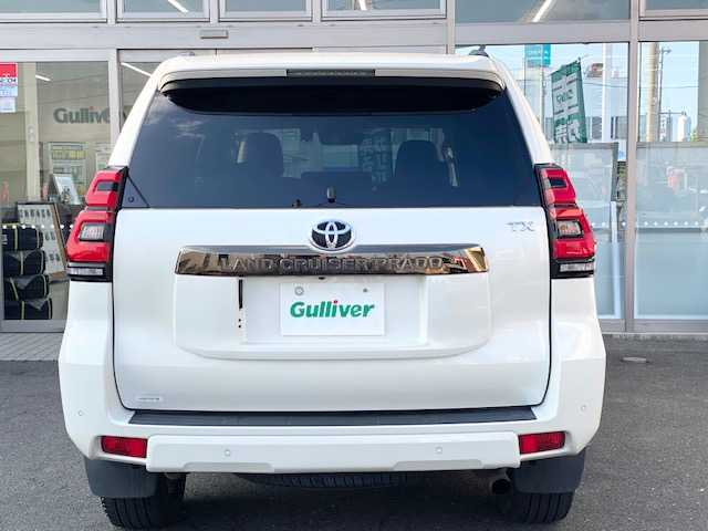 トヨタ ランドクルーザー プラド TX Lパッケージ ブラックED 青森県 2021(令3)年 2.2万km ホワイトパールクリスタルシャイン 寒冷地仕様/ワンオーナー/プリクラッシュセーフティ/アダプティブクルーズコントロール/オートマチックハイビーム/レーンアシスト/黒レザーシート/社外ナビ(BT/フルセグ/DVD/CD/ラジオ)/パワーシート(D/N)/バックカメラ/LEDヘッドライト/純正スマートキー一体型エンジンスターター /エアーシート/シートヒーター/ドライブレコーダー/トノカバー/オートライト/フォグライト/リヤフォグライト/ヘッドライトウォッシャー/スペアタイヤ/スペアキー/ETC/新車時保証書/取扱説明書