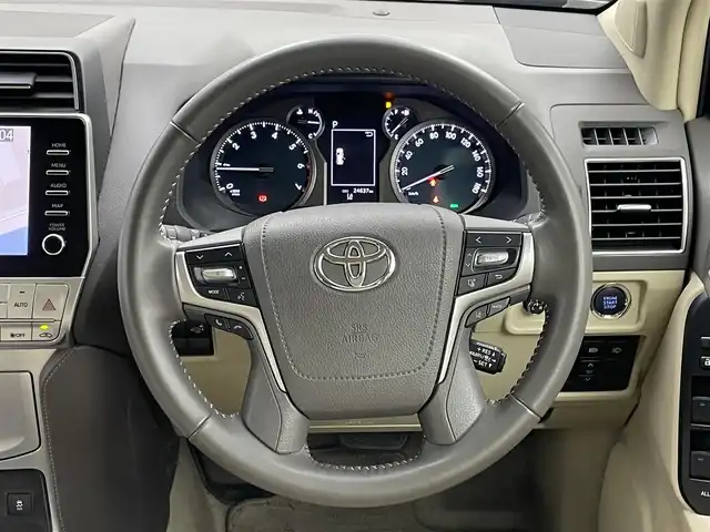 トヨタ ランドクルーザー プラド TX Lパッケージ マットブラED 岡山県 2023(令5)年 2.5万km ブラック メーカー9インチナビ/（BT/Carplay/TV)/パノラミックビューモニター/サンルーフ/ビルトインＥＴＣ２．０/前席パワーシート/ベージュレザーシート/シートベンチレーション/D席シートメモリー/ルーフレール/衝突軽減ブレーキ/LEDヘッドライト/オートハイビーム/追従型クルーズコントロール/社外ドライブレコーダー(前)/純正フロアマット/純正ドアバイザー/スペアキー