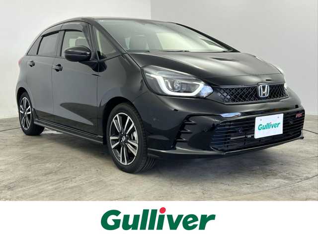 ホンダ フィット e:HEV RS 愛知県 2024(令6)年 0.2万km 黒 ホンダセンシング/　・衝突軽減ブレーキ/　・誤発進抑制機能/　・後方誤発進抑制機能/　・近距離衝突軽減ブレーキ/　・歩行者事故低減ステアリング/　・路外逸脱抑制機能/　・渋滞追従機能付アダプティブクルーズコントロール/　・車線維持支援システム/　・トラフィックジャムアシスト/　・先行車発進お知らせ機能/　・標識認識機能/　・オートハイビーム/純正ナビ/（Bluetooth/フルセグTV/USB）/バックカメラ/ETC2.0/ドライブレコーダー/ハーフレザー/オートライト/電子パーキング/オートホールド/ドアバイザー/純正フロアマット/パドルシフト/純正LEDライト