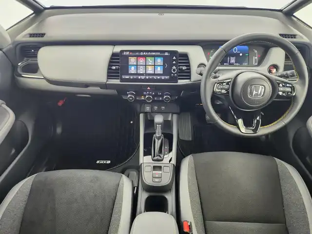 ホンダ フィット e:HEV RS 愛知県 2024(令6)年 0.2万km 黒 ホンダセンシング/　・衝突軽減ブレーキ/　・誤発進抑制機能/　・後方誤発進抑制機能/　・近距離衝突軽減ブレーキ/　・歩行者事故低減ステアリング/　・路外逸脱抑制機能/　・渋滞追従機能付アダプティブクルーズコントロール/　・車線維持支援システム/　・トラフィックジャムアシスト/　・先行車発進お知らせ機能/　・標識認識機能/　・オートハイビーム/純正ナビ/（Bluetooth/フルセグTV/USB）/バックカメラ/ETC2.0/ドライブレコーダー/ハーフレザー/オートライト/電子パーキング/オートホールド/ドアバイザー/純正フロアマット/パドルシフト/純正LEDライト