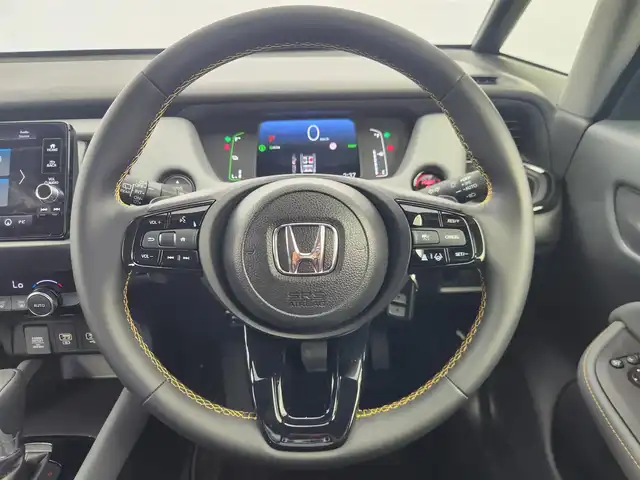 ホンダ フィット e:HEV RS 愛知県 2024(令6)年 0.2万km 黒 ホンダセンシング/　・衝突軽減ブレーキ/　・誤発進抑制機能/　・後方誤発進抑制機能/　・近距離衝突軽減ブレーキ/　・歩行者事故低減ステアリング/　・路外逸脱抑制機能/　・渋滞追従機能付アダプティブクルーズコントロール/　・車線維持支援システム/　・トラフィックジャムアシスト/　・先行車発進お知らせ機能/　・標識認識機能/　・オートハイビーム/純正ナビ/（Bluetooth/フルセグTV/USB）/バックカメラ/ETC2.0/ドライブレコーダー/ハーフレザー/オートライト/電子パーキング/オートホールド/ドアバイザー/純正フロアマット/パドルシフト/純正LEDライト