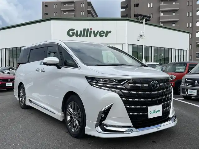 トヨタ アルファード Z 長崎県 2024(令6)年 1.3万km プラチナホワイトパールマイカ モデリスタエアロ/サンルーフ/純正フリップダウンモニター/ＡＣ１００Ｖ/純正ナビ/全方位カメラ/デジタルインナーミラー/レザーシート/前席シートヒーター/前席パワーシート/シートベンチレーション/トヨタセーフティーセンス/ブラインドスポットモニター/両側パワースライドドア/レーダークルーズコントロール/レーンキープアシスト/ステアリングヒーター/パワーシート/運転席シートメモリー/ステアスイッチ/パワーバックドア/ETC2.0/オートライト/LEDヘッドライト/オートハイビーム/スペアキー