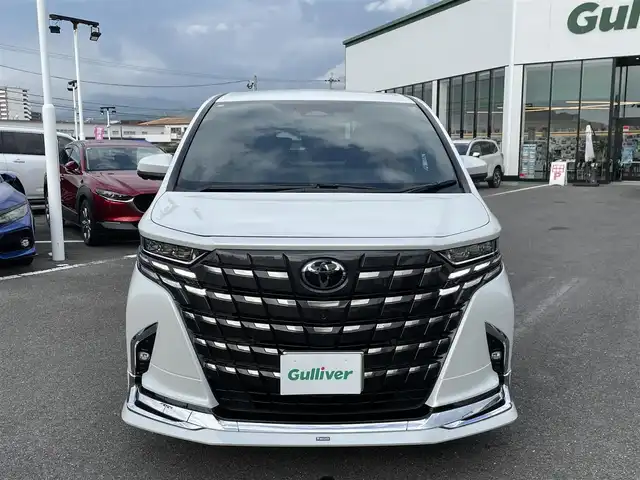トヨタ アルファード Z 長崎県 2024(令6)年 1.3万km プラチナホワイトパールマイカ モデリスタエアロ/サンルーフ/純正フリップダウンモニター/ＡＣ１００Ｖ/純正ナビ/全方位カメラ/デジタルインナーミラー/レザーシート/前席シートヒーター/前席パワーシート/シートベンチレーション/トヨタセーフティーセンス/ブラインドスポットモニター/両側パワースライドドア/レーダークルーズコントロール/レーンキープアシスト/ステアリングヒーター/パワーシート/運転席シートメモリー/ステアスイッチ/パワーバックドア/ETC2.0/オートライト/LEDヘッドライト/オートハイビーム/スペアキー