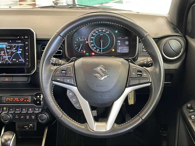 スズキ イグニス ハイブリッド F リミテッド 福井県 2016(平28)年 5万km ピュアホワイトP ４WD/ワンオーナー/純正7インチメモリーナビ/フルセグTV/BT/CD/DVD/USB/アラウンドビューモニター/セーフティサポート/・デュアルカメラブレーキサポート/・車線逸脱警報機能/・誤発進抑制機能/・ふらつき防止機能/クルーズコントロール/ETC/前後ドライブレコーダー/オートライト/オートハイビーム/LEDヘッドライト/レザーシート/シートヒーター/純正16インチアルミホイール/社外アルミホイール付スタッドレスタイヤ車載/純正フロアマット/MTモード付AT/パドルシフト