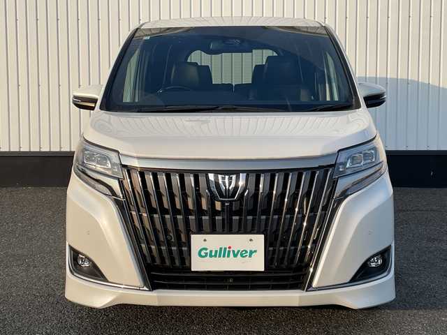 トヨタ エスクァイア Gi プレミアムパッケージ ブラックテーラード 千葉県 2020(令2)年 4.7万km ホワイトパールクリスタルシャイン 純正10インチメモリナビ/(フルセグTV/BT/CD/DVD/FM/AM)/衝突被害軽減システム/車線逸脱警報/バックカメラ/クルーズコントロール/フリップダウンモニター/両側パワースライドドア/横滑り防止装置/ETC/アイドリングストップ/LEDヘッドライト/フォグランプ/オートライト/ウィンカーミラー/電動格納ミラー/純正15インチAW/シートヒーター/シートリフター/ステアリングヒーター/プッシュスタート/スマートキー/フロアマット/スペアキー/保証書