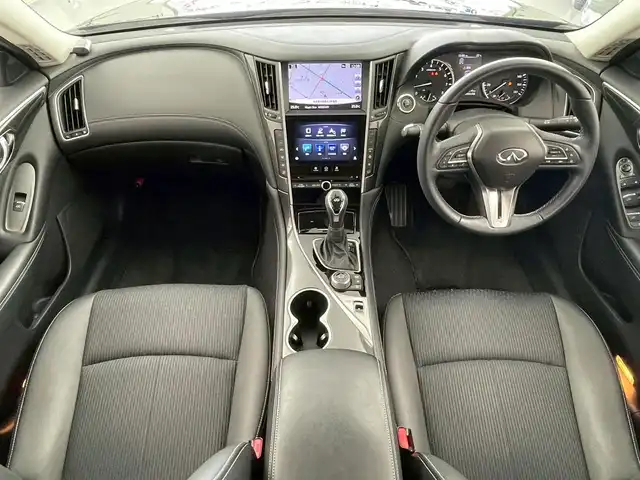 日産 スカイライン 200GT－t 岐阜県 2018(平30)年 10万km スーパーブラック 純正ナビ/CD/DVD/Bluetooth/AM/FM/USB/AUX/ワンセグTV/アラウンドビューモニター/コーナーセンサー/インテリジェントクルーズコントロール/パワーシート/レザーシート/ドライブモード/ステアリングスイッチ/革巻きステアリング/左右独立温度コントロール式フルオートエアコン/電動格納ミラー/オートワイパー/オートLEDヘッドライト/マニュアルモード付AT/パワーウィンドウ/スマートキー/プッシュスタート/純正フロアマット/純正17インチアルミホイール/ドアバイザー