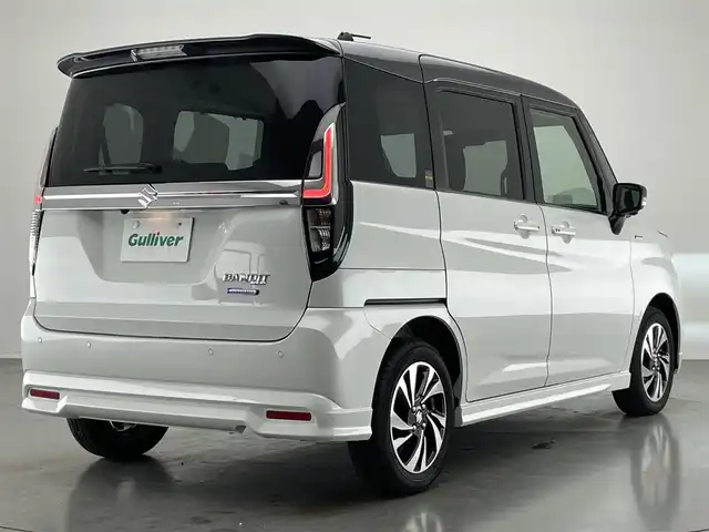 スズキ ソリオ バンディット HV MV 愛知県 2024(令6)年 1万km ピュアホワイトパール/ガンメタリック2トーン 純正９型ナビ　全方位カメラ　シートヒーター　ＨＵＤ　ツートンカラー　デュアルカメラブレーキ　衝突軽減　追従クルコン　リヤパーキングセンサー　両側パワスラ　ＬＥＤオートライト　フルセグＴＶ　ＤＶＤ　禁煙
