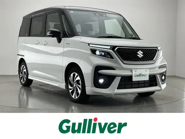 スズキ ソリオ バンディット HV MV 愛知県 2024(令6)年 1万km ピュアホワイトパール/ガンメタリック2トーン 純正９型ナビ　全方位カメラ　シートヒーター　ＨＵＤ　ツートンカラー　デュアルカメラブレーキ　衝突軽減　追従クルコン　リヤパーキングセンサー　両側パワスラ　ＬＥＤオートライト　フルセグＴＶ　ＤＶＤ　禁煙