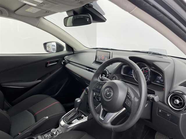 マツダ デミオ XD ツーリング 富山県 2015(平27)年 4.1万km メテオグレーマイカ 純正ナビ（AM/FM/BT/USB/DVD/ワンセグ）/衝突被害軽減システム/クルーズコントロール/横滑り防止装置/アイドリングストップ/純正アルミホイール/純正フロアマット/オートキセノンライト/ETC/革巻きステアリング/ステアリングスイッチ/パドルシフト/スマートキー