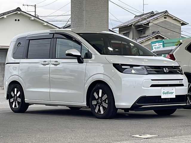 ホンダ フリード ハイブリット e:HEV AIR EX 愛媛県 2025(令7)年 0.3万km プラチナホワイトパール ワンオーナー/11.4インチ純正メモリナビ/・フルセグTV/・CD/DVD再生/・Bluetooth接続/・AppleCarPlay/・AndroidAuto/ホンダセンシング/・衝突軽減ブレーキ/・踏み間違い衝突軽減システム/・急アクセル抑制機能/・路外逸脱抑制機能/・歩行者事故低減ステアリング/・先行車発進お知らせ機能/・標識認識機能/・ブラインドスポットインフォメーション/・オートハイビーム/・アダプティブドライビングビーム/・パーキングセンサーシステム/バックカメラ/ETC/両側パワースライドドア/前後ドライブレコーダー/3列シート/ハーフレザーシート/前席シートヒーター/LEDヘッドライト