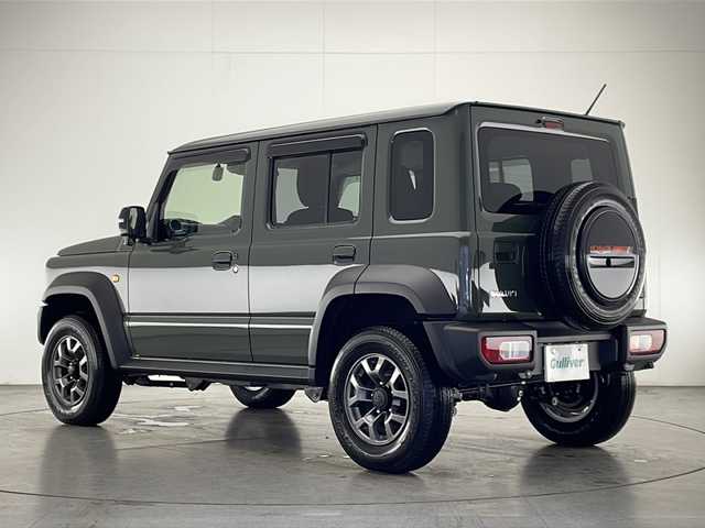 スズキ ジムニー ノマド FC 宮崎県 2025(令7)年 0.1万km Ｄグリーン 禁煙車/パートタイム4WD/衝突被害軽減ブレーキ/純正8型ナビTV/（Kenwood/SKX-S809/CD/DVD/Bluetooth/フルセグTV)/純正バックカメラ/純正OP前後ドライブレコーダー/純正OPスペアタイヤハーフカバーデカール/純正LEDオートライト/純正フォグ/純正セキュリティアラーム/純正ドアバイザー/純正フロアマット/社外LEDルームランプ/アダプティブクルーズコントロール/レーンディパーチャーアラート/クリアランスソナー/ダウンヒルアシストコントロール/ウインカードアミラー/本革巻ハンドル/前席シートヒーター/オートエアコン/ETC/スマートキー/プッシュエンジンスタート/スペアキー/新車時保証書/取扱い説明書