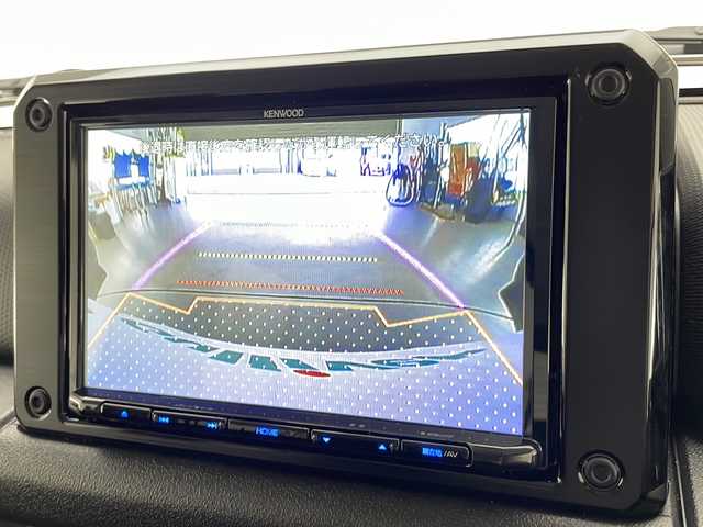 スズキ ジムニー ノマド FC 宮崎県 2025(令7)年 0.1万km Ｄグリーン 禁煙車/パートタイム4WD/衝突被害軽減ブレーキ/純正8型ナビTV/（Kenwood/SKX-S809/CD/DVD/Bluetooth/フルセグTV)/純正バックカメラ/純正OP前後ドライブレコーダー/純正OPスペアタイヤハーフカバーデカール/純正LEDオートライト/純正フォグ/純正セキュリティアラーム/純正ドアバイザー/純正フロアマット/社外LEDルームランプ/アダプティブクルーズコントロール/レーンディパーチャーアラート/クリアランスソナー/ダウンヒルアシストコントロール/ウインカードアミラー/本革巻ハンドル/前席シートヒーター/オートエアコン/ETC/スマートキー/プッシュエンジンスタート/スペアキー/新車時保証書/取扱い説明書