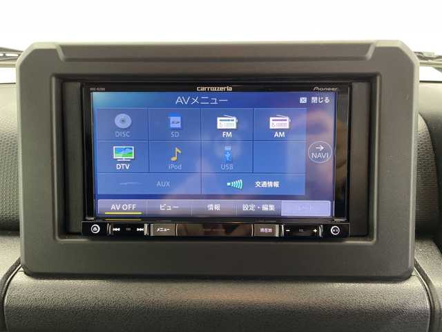 スズキ ジムニー シエラ JC 栃木県 2022(令4)年 1.8万km ジャングルグリーン 社外ナビ/(フルセグTV/SD/CD/DVD)/禁煙車/ヘッドライトウォッシャー/4WD/バックカメラ/衝突軽減ブレーキ/シートヒーター/オートライト/LEDヘッドライト/横滑り防止装置/フォグランプ/スマートキー/プッシュスタート/アイドリングストップ/ステアリングスイッチ/電動格納ミラー/純正15インチアルミホイール/純正フロアマット