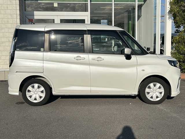 スズキ ソリオ G 香川県 2022(令4)年 4.9万km ピュアホワイトP 純正ナビ（フルセグTV/CD/DVD/BT）/バックカメラ/デジタルインナーミラー/両側スライドドア/コーナーセンサー/オートライト/ビルトインＥＴＣ/4WD