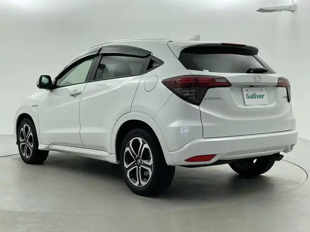 ホンダ ヴェゼル ハイブリッド Z ホンダセンシング 福井県 2020(令2)年 2.8万km プラチナホワイトパール AIS検査済み/車検R9年3月4日まで/ハイブリッドモデル/純正８インチメモリナビゲーション/（CD/DVD/BT）/フルセグテレビ/バックカメラ/ホンダセンシング/レーンキープアシスト/アダプティブクルーズコントロール/純正17インチアルミホイール/ルーフレール/ハーフレザーシート/LEDヘッドライト/LEDフォグランプ/ETC(ビルトイン)/前後ドライブレコーダー/パドルシフト/シートヒーター（前席）/オートライト/ステアリングリモコン/ミラーヒーター/電動格納ミラー/USBポート/プッシュスタート/スマートキー/アイドリングストップ/新車保証書/取扱説明書