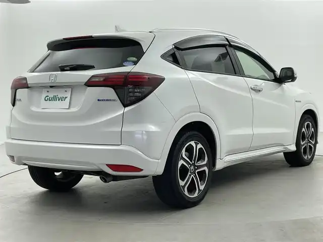 ホンダ ヴェゼル ハイブリッド Z ホンダセンシング 福井県 2020(令2)年 2.8万km プラチナホワイトパール AIS検査済み/車検R9年3月4日まで/ハイブリッドモデル/純正８インチメモリナビゲーション/（CD/DVD/BT）/フルセグテレビ/バックカメラ/ホンダセンシング/レーンキープアシスト/アダプティブクルーズコントロール/純正17インチアルミホイール/ルーフレール/ハーフレザーシート/LEDヘッドライト/LEDフォグランプ/ETC(ビルトイン)/前後ドライブレコーダー/パドルシフト/シートヒーター（前席）/オートライト/ステアリングリモコン/ミラーヒーター/電動格納ミラー/USBポート/プッシュスタート/スマートキー/アイドリングストップ/新車保証書/取扱説明書