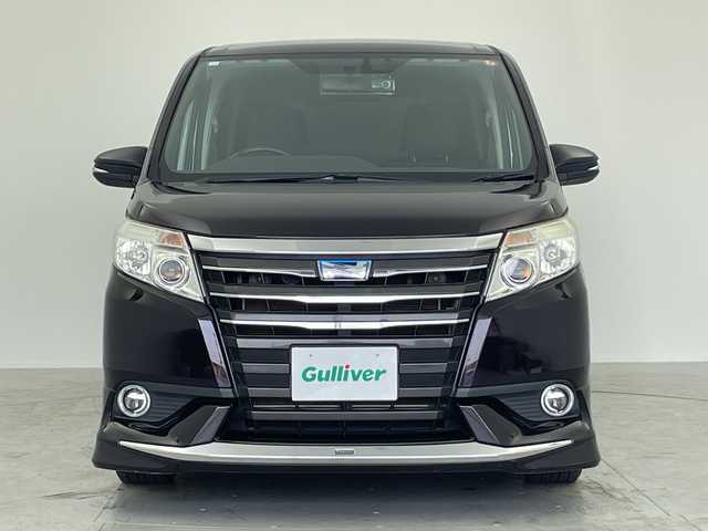 トヨタ ノア ハイブリッド G 愛知県 2014(平26)年 9.7万km ボルドーマイカメタリック モデリスタエアロ/純正9型ナビ/・Bluetooth/・CD/DVD/・フルセグテレビ/・SD音楽録音/純正フリップダウンモニター/バックカメラ/両側パワースライドドア/クルーズコントロール/オートライト/前方ドライブレコーダー/ETC/LEDヘッドライト