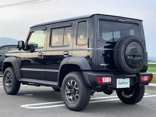スズキ ジムニー ノマド FC 佐賀県 2025(令7)年 0.1万km 黒 登録時走行距離163km/社外9型メモリナビゲーション【M7V-M911HDL】/・BT/CD/DVD/SD/フルセグTV/・Apple Car Play/Android Auto/バックカメラ/前後ドライブレコーダー/ETC/DN席シートヒーター/革巻きステアリング/ステアリングリモコン/プッシュスタート/スマートキー/純正15インチアルミホイール/LEDヘッドライト/オートライト/ハイビームアシスト/純正フロアマット/純正ドアバイザー/新車保証書/取扱説明書/スペアキー1本/スズキセーフティサポート/・デュアルカメラブレーキサポート/・車線逸脱警報機能/・誤発進抑制機能/・先行車発進お知らせ/・標識認識機能/・コーナーセンサー/・アダプティブクルーズコントロール