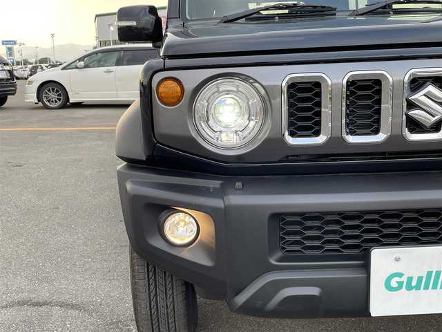 スズキ ジムニー ノマド FC 佐賀県 2025(令7)年 0.1万km 黒 登録時走行距離163km/社外9型メモリナビゲーション【M7V-M911HDL】/・BT/CD/DVD/SD/フルセグTV/・Apple Car Play/Android Auto/バックカメラ/前後ドライブレコーダー/ETC/DN席シートヒーター/革巻きステアリング/ステアリングリモコン/プッシュスタート/スマートキー/純正15インチアルミホイール/LEDヘッドライト/オートライト/ハイビームアシスト/純正フロアマット/純正ドアバイザー/新車保証書/取扱説明書/スペアキー1本/スズキセーフティサポート/・デュアルカメラブレーキサポート/・車線逸脱警報機能/・誤発進抑制機能/・先行車発進お知らせ/・標識認識機能/・コーナーセンサー/・アダプティブクルーズコントロール