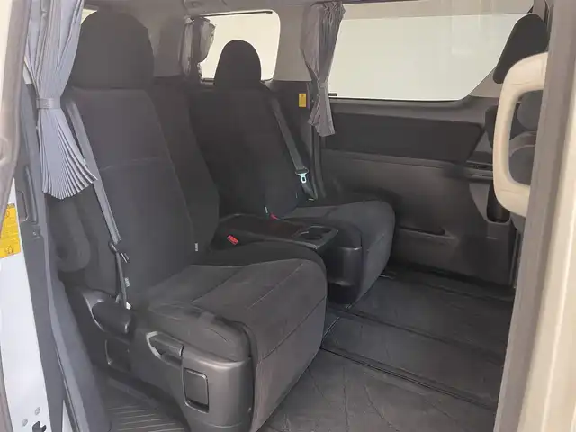 トヨタ ヴェルファイア 2．4Z 愛知県 2014(平26)年 7.5万km ホワイトパールクリスタルシャイン 純正９型ナビ　純正後席モニター　禁煙車　フルセグＴＶ　ＤＶＤ　両側パワスラ　ＷＥＤＳ１７インチＡＷ　コーナーセンサー　ＥＴＣ　バックカメラ　オットマン HIDヘッドライト　オートライト　フォグランプ