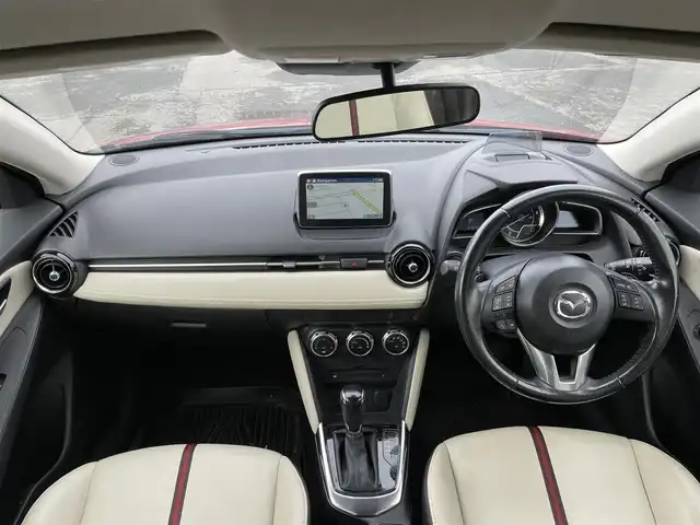 マツダ デミオ XD ツーリング Lパッケージ 道央・札幌 2014(平26)年 12.3万km ソウルレッドプレミアムメタリック ４WD/純正メモリーナビ/AM/FM/BT/CD/DVD/フルセグ/衝突被害軽減ブレーキ/横滑り防止装置/クルーズコントロール/ビルトインETC/アイドリングストップ/ハーフレザーシート/革巻きステアリング/ステアリングリモコン/パドルシフト/MTモード付AT/プッシュスタート/スマートキー/LEDヘッドライト/オートライト/フォグランプ/電動格納ミラー/ウィンカーミラー/純正フロアマット/ドアバイザー/スペアキー