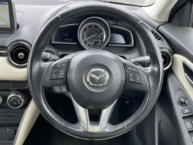 マツダ デミオ XD ツーリング Lパッケージ 道央・札幌 2014(平26)年 12.3万km ソウルレッドプレミアムメタリック ４WD/純正メモリーナビ/AM/FM/BT/CD/DVD/フルセグ/衝突被害軽減ブレーキ/横滑り防止装置/クルーズコントロール/ビルトインETC/アイドリングストップ/ハーフレザーシート/革巻きステアリング/ステアリングリモコン/パドルシフト/MTモード付AT/プッシュスタート/スマートキー/LEDヘッドライト/オートライト/フォグランプ/電動格納ミラー/ウィンカーミラー/純正フロアマット/ドアバイザー/スペアキー